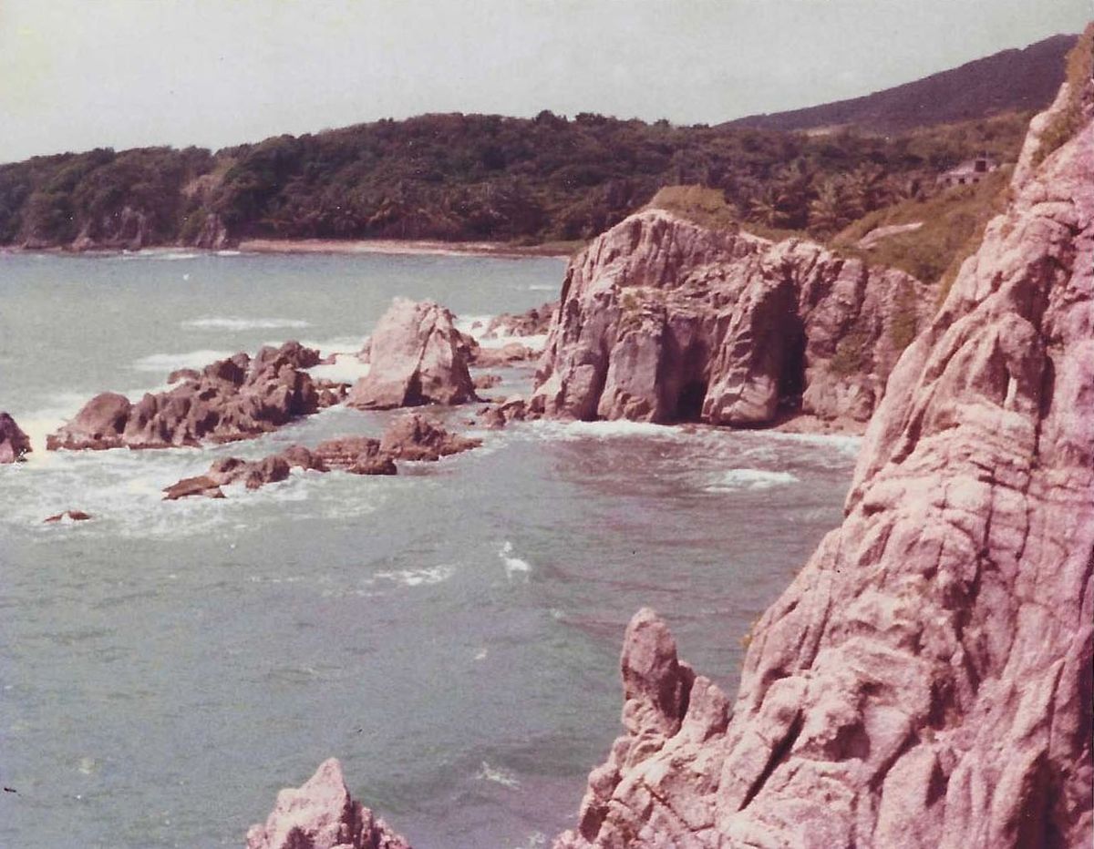 Rocky sea cliffs and cave arches at Cueva del Indio, Arecibo, Puerto Rico